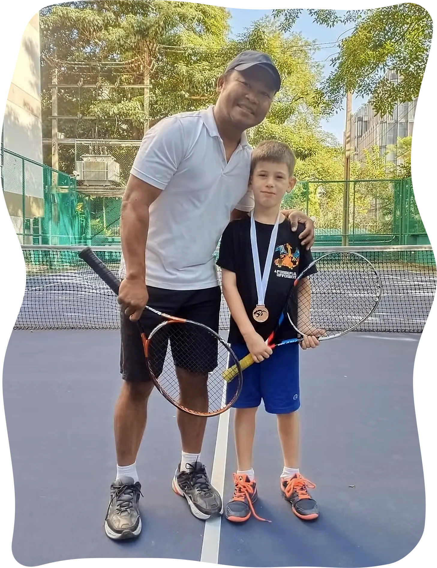 Coach Mikey with student